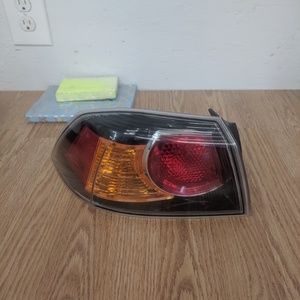 MITSUBISHI LANCER TAIL LIGHT REAR LEFT DRIVER